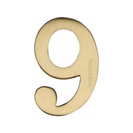 This is an image of a Heritage Brass - Numeral 9 Self Adhesive 51mm (2") Satin Brass Finish, c1568-9-sb that is available to order from Trade Door Handles in Kendal.