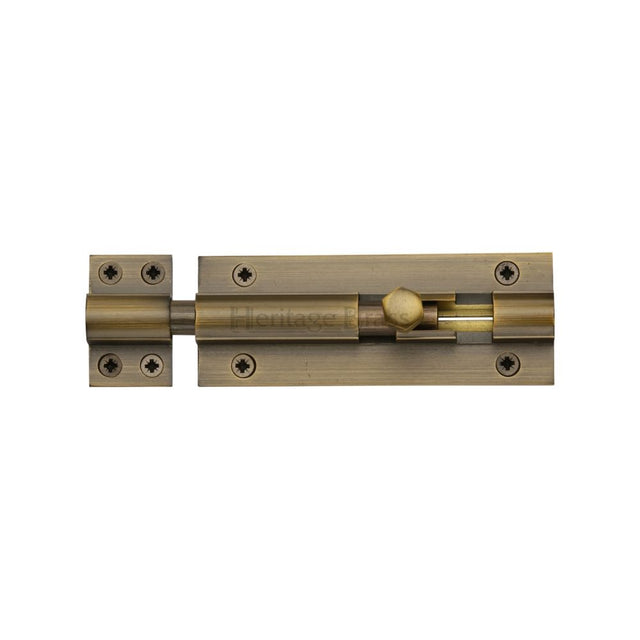 This is an image of a Heritage Brass - Door Bolt Straight 4" x 1.5" Antique Brass Finish, c1584-4-at that is available to order from Trade Door Handles in Kendal.