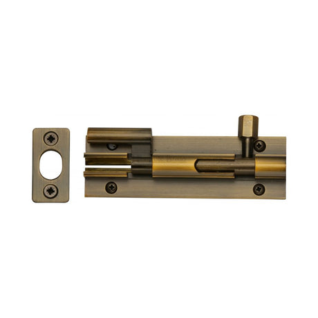 This is an image of a Heritage Brass - Door Bolt Necked 4" x 1.25" Antique Brass Finish, c1592-4-at that is available to order from Trade Door Handles in Kendal.