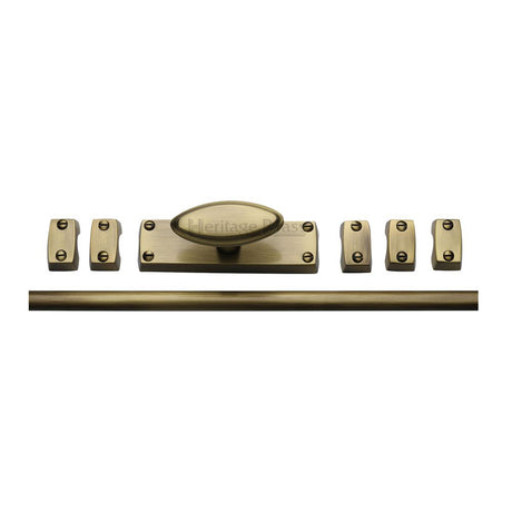 This is an image of a Heritage Brass - Espagnolette Bolt Antique Brass Finish, c1688-at that is available to order from Trade Door Handles in Kendal.