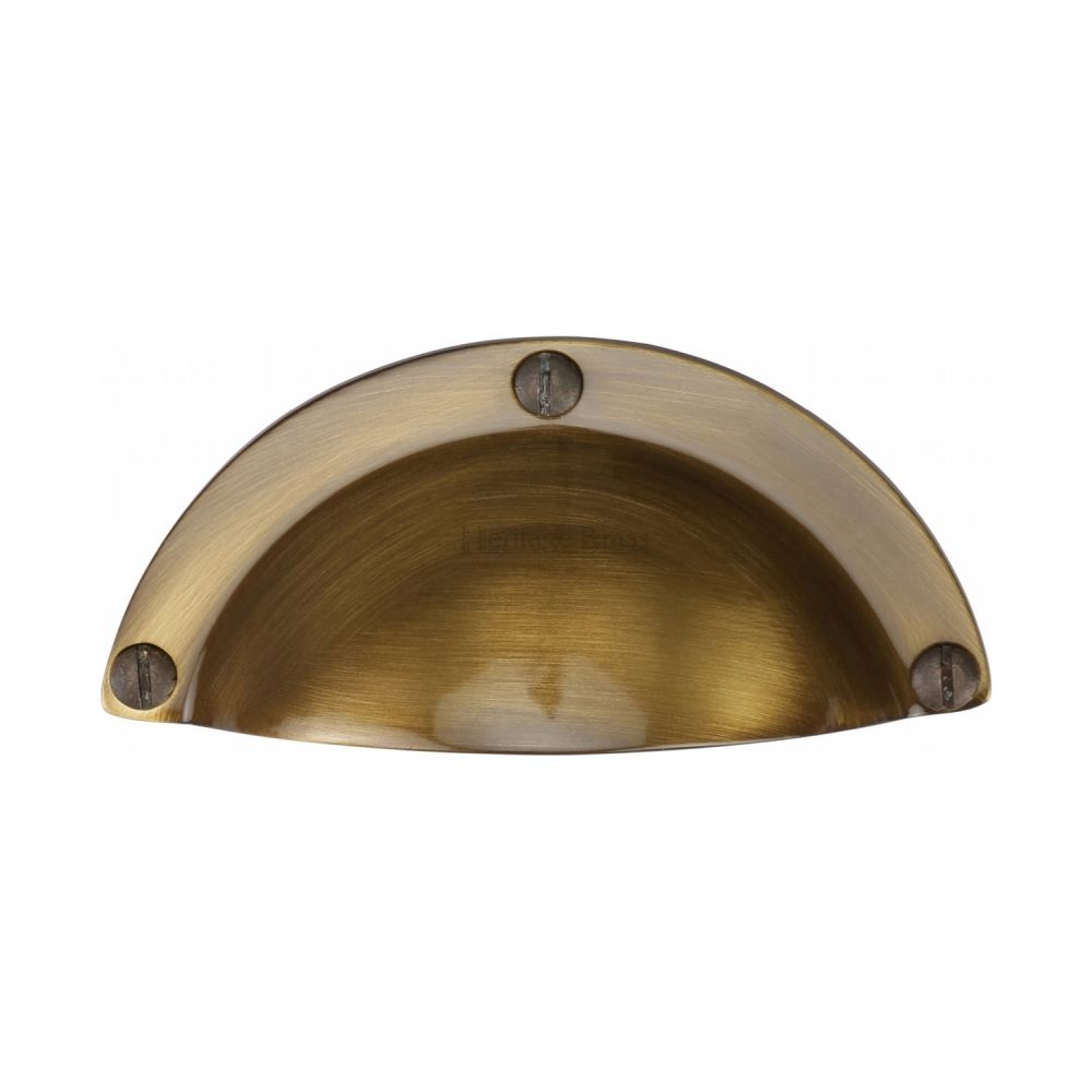 High quality image of Heritage Brass - Drawer Cup Pull Traditional Design Antique Brass Finish | Sku. c1700-at | Trade Door Handles, Kendal.
