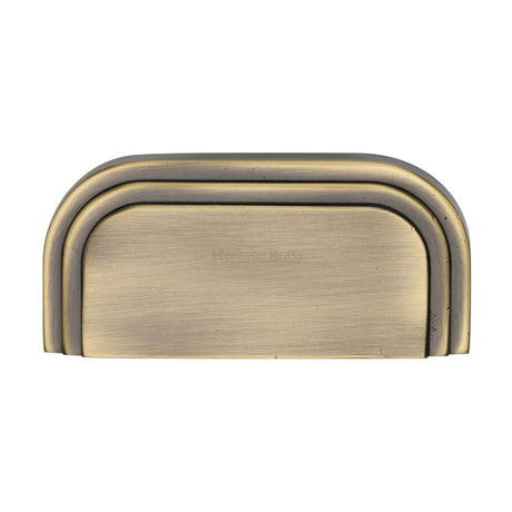 This is an image of a Heritage Brass - Drawer Cup Pull Bauhaus Design 76mm CTC Antique Brass Finish, c1740-at that is available to order from Trade Door Handles in Kendal.