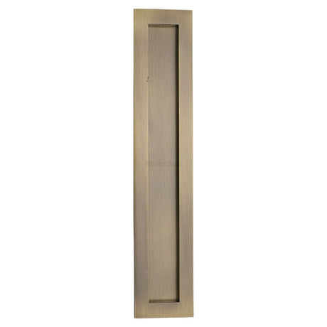 This is an image of a Heritage Brass - Rectangular Flush Pull 300 x 58mm Antique Brass Finish, c1855-300-at that is available to order from Trade Door Handles in Kendal.