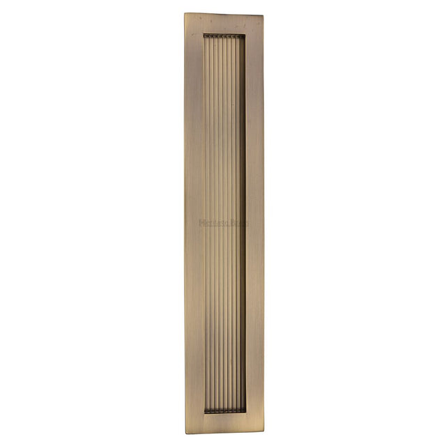 This is an image of a Heritage Brass - Reeded Rectangular Flush Pull 300 x 58mm Antique Brass Finish, c1865-300-at that is available to order from Trade Door Handles in Kendal.