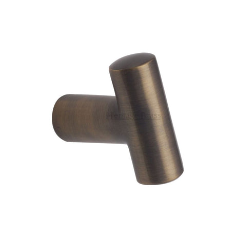 This is an image of a Heritage Brass - Cabinet Knob T Shaped 35mm Antique Brass Finish, c2234-at that is available to order from Trade Door Handles in Kendal.