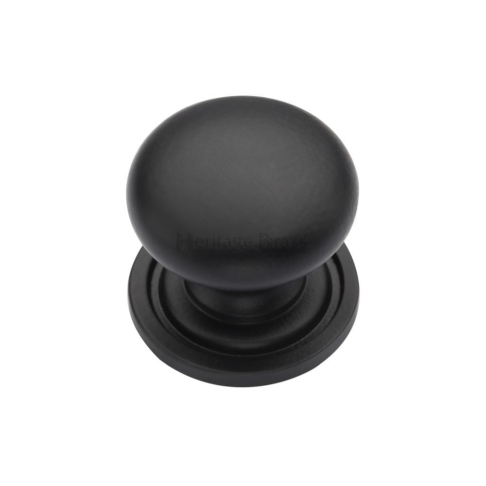 This is a image of a Heritage Brass - Cabinet Knob Victorian Round Design with base 25mm Matt Black F that is available to order from Trade Door Handles in Kendal