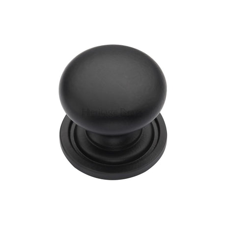 This is an image of a Heritage Brass - Cabinet Knob Victorian Round Design with base 25mm Matt Black F, c2240-25-bkmt that is available to order from Trade Door Handles in Kendal.