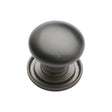 This is an image of a Heritage Brass - Cabinet Knob Victorian Round Design with base 25mm Matt Bronze, c2240-25-mb that is available to order from Trade Door Handles in Kendal.