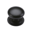 This is a image of a Heritage Brass - Cabinet Knob Victorian Round Design with base 32mm Matt Black F that is available to order from Trade Door Handles in Kendal