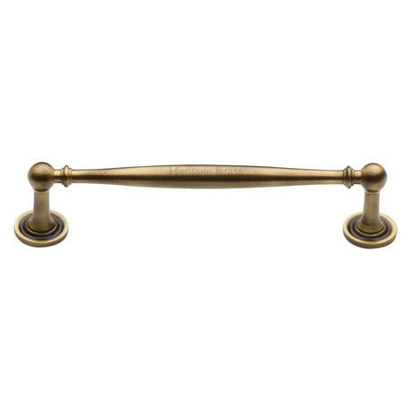 This is an image of a Heritage Brass - Cabinet Pull Colonial Design 152mm CTC Antique Brass Finish, c2533-152-at that is available to order from Trade Door Handles in Kendal.