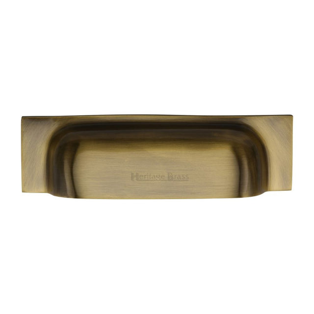 This is a image of a Heritage Brass - Drawer Cup Pull Military Design 152mm CTC Ant. Brass Finish that is available to order from Trade Door Handles in Kendal