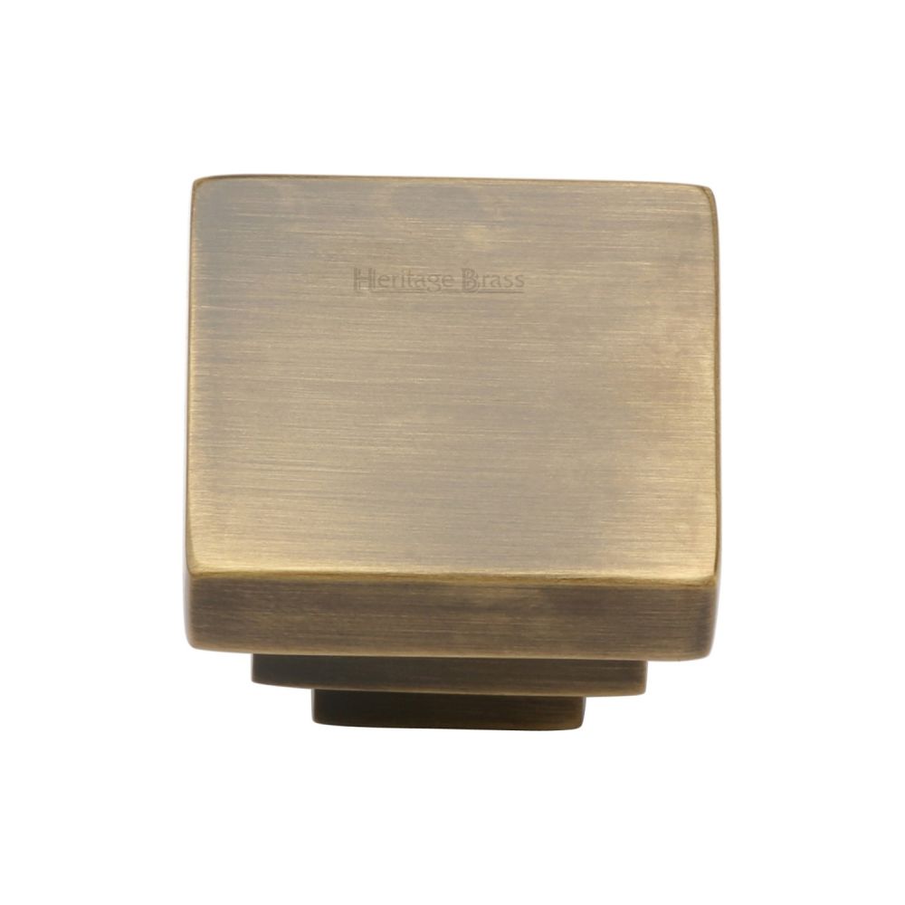 This is an image of a Heritage Brass - Cabinet Knob Square Stepped Design 32mm Antique Brass Finish, c3672-32-at that is available to order from Trade Door Handles in Kendal.