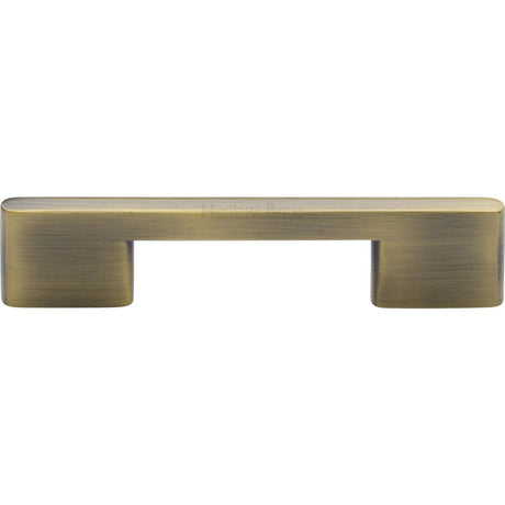 This is an image of a Heritage Brass - Cabinet Pull Slim Metro Design 96mm CTC Antique Brass Finish, c3681-96-at that is available to order from Trade Door Handles in Kendal.