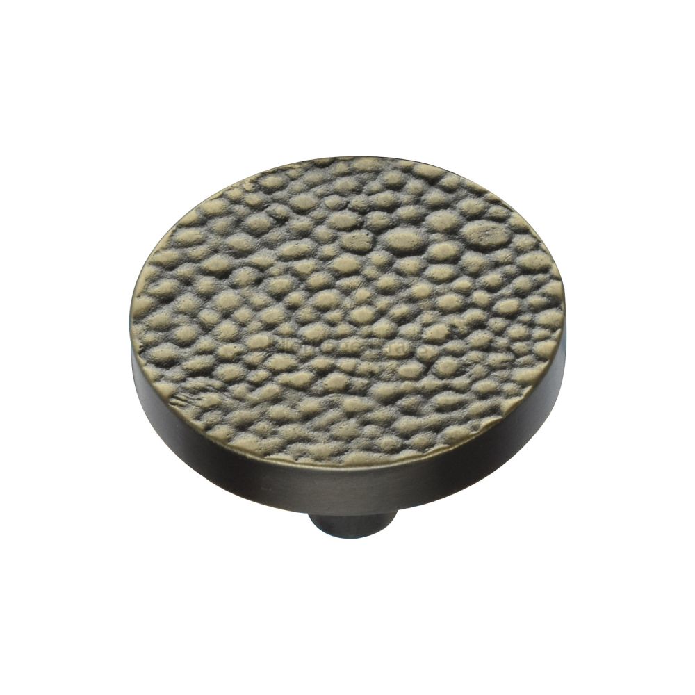 This is a image of a Heritage Brass - Cabinet Knob Round Stingray Design 38mm Aged Brass Finish that is available to order from Trade Door Handles in Kendal