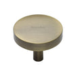 This is an image of a Heritage Brass - Cabinet Knob Domed Disc Design 38mm Antique Brass Finish, c3875-38-at that is available to order from Trade Door Handles in Kendal.