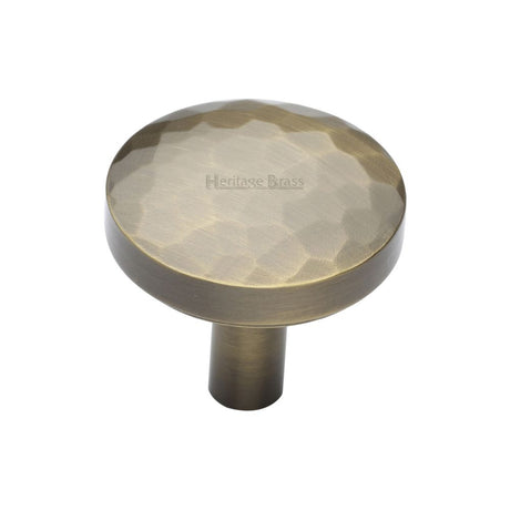 This is an image of a Heritage Brass - Cabinet Knob Round Hammered Design 32mm Antique Brass Finish, c3877-32-at that is available to order from Trade Door Handles in Kendal.