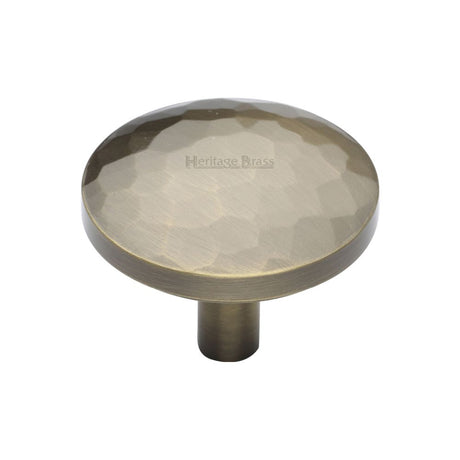 This is an image of a Heritage Brass - Cabinet Knob Round Hammered Design 38mm Antique Brass Finish, c3877-38-at that is available to order from Trade Door Handles in Kendal.