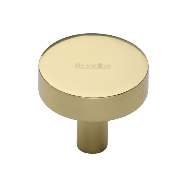 This is a image of a Heritage Brass - Cabinet Knob Disc Design 32mm Pol. Brass Finish that is available to order from Trade Door Handles in Kendal