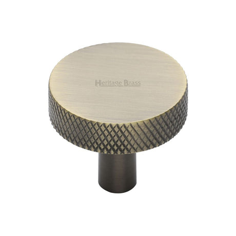 This is an image of a Heritage Brass - Cabinet Knob Knurled Disc Design 32mm Antique Brass Finish, c3884-32-at that is available to order from Trade Door Handles in Kendal.