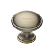 This is a image of a Heritage Brass - Cabinet Knob Domed Design 32mm Ant. Brass Finish that is available to order from Trade Door Handles in Kendal