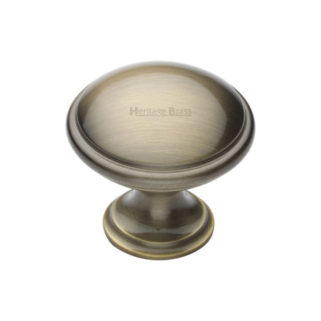 This is an image of a Heritage Brass - Cabinet Knob Domed Design 32mm Antique Brass Finish, c3950-32-at that is available to order from Trade Door Handles in Kendal.