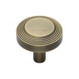 This is a image of a Heritage Brass - Cabinet Knob Ridge Design 32mm Ant. Brass Finish that is available to order from Trade Door Handles in Kendal