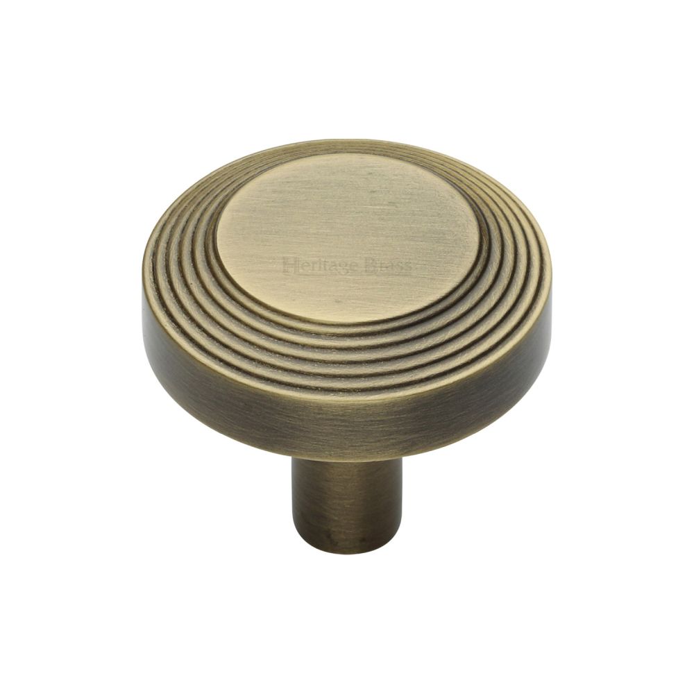 This is a image of a Heritage Brass - Cabinet Knob Ridge Design 32mm Ant. Brass Finish that is available to order from Trade Door Handles in Kendal