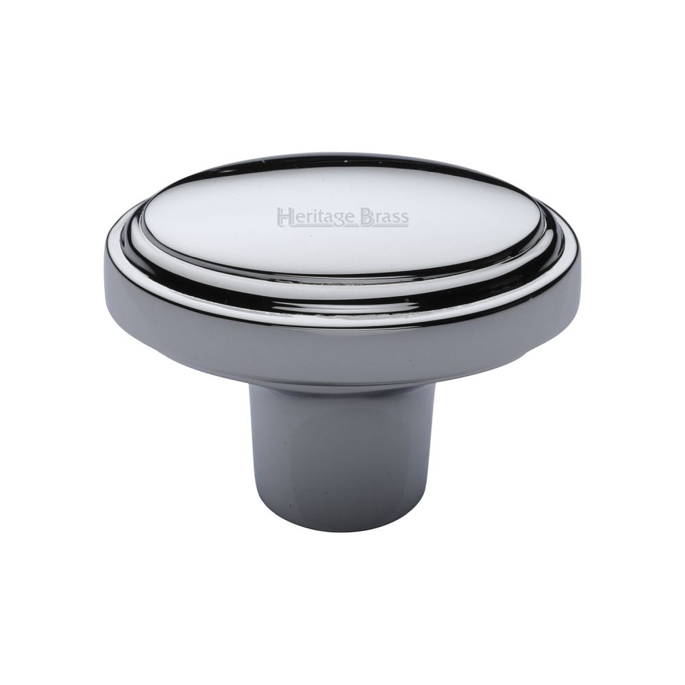 This is a image of a Heritage Brass - Cabinet Knob Stepped Oval Design 41mm Pol. Chrome Finish that is available to order from Trade Door Handles in Kendal