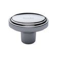 This is an image of a Heritage Brass - Cabinet Knob Stepped Oval Design 41mm Polished Chrome Finish, c3975-pc that is available to order from Trade Door Handles in Kendal.