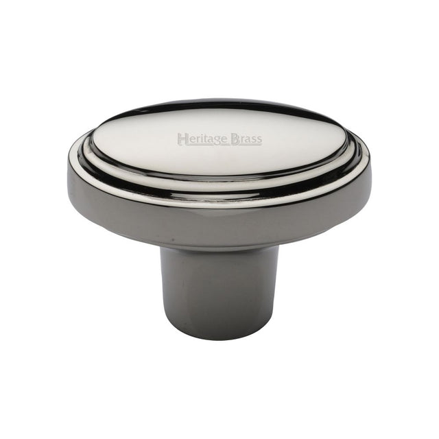 This is a image of a Heritage Brass - Cabinet Knob Stepped Oval Design 41mm Pol. Nickel Finish that is available to order from Trade Door Handles in Kendal