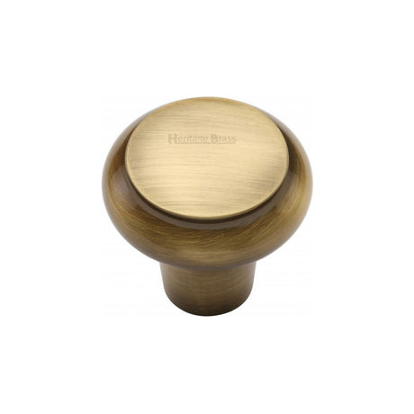 This is an image of a Heritage Brass - Cabinet Knob Round Edge Design 32mm Antique Brass Finish, c3990-32-at that is available to order from Trade Door Handles in Kendal.