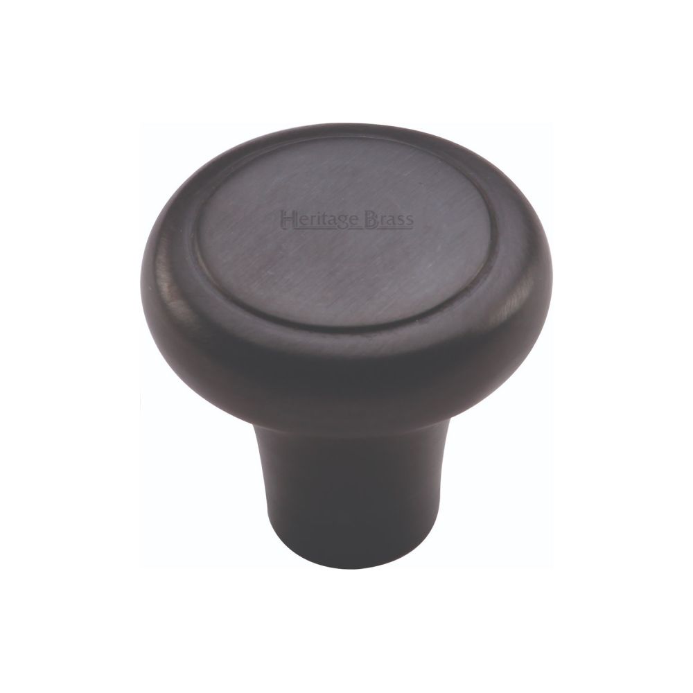 This is an image of a Heritage Brass - Cabinet Knob Round Edge Design 32mm Matt Black Finish, c3990-32-bkmt that is available to order from Trade Door Handles in Kendal.