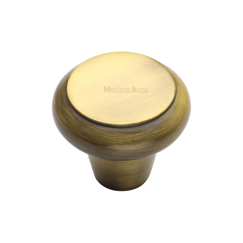 This is an image of a Heritage Brass - Cabinet Knob Round Edge Design 38mm Antique Brass Finish, c3990-38-at that is available to order from Trade Door Handles in Kendal.