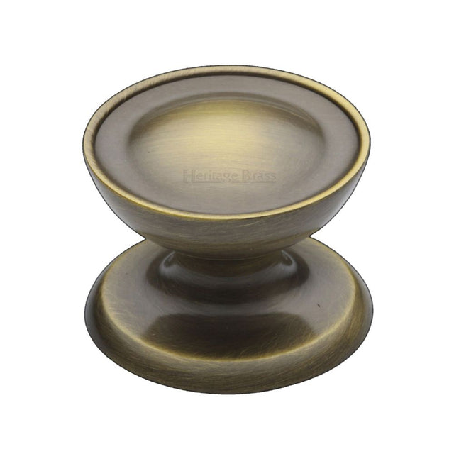 This is an image of a Heritage Brass - Cabinet Knob Surrey Design 38mm Antique Brass Finish, c4386-38-at that is available to order from Trade Door Handles in Kendal.