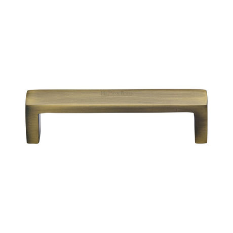 This is an image of a Heritage Brass - Cabinet Pull Wide Metro Design 101mm CTC Antique Brass Finish, c4520-101-at that is available to order from Trade Door Handles in Kendal.