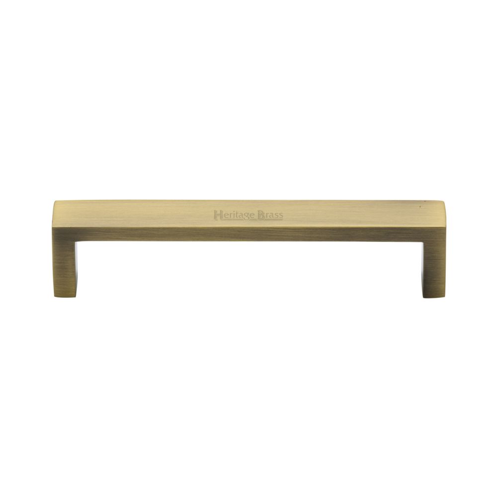 This is an image of a Heritage Brass - Cabinet Pull Wide Metro Design 128mm CTC Antique Brass Finish, c4520-128-at that is available to order from Trade Door Handles in Kendal.