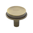 This is an image of a Heritage Brass - Flat Round Knob Design 38 mm Antique Brass finish, c4592-38-at that is available to order from Trade Door Handles in Kendal.