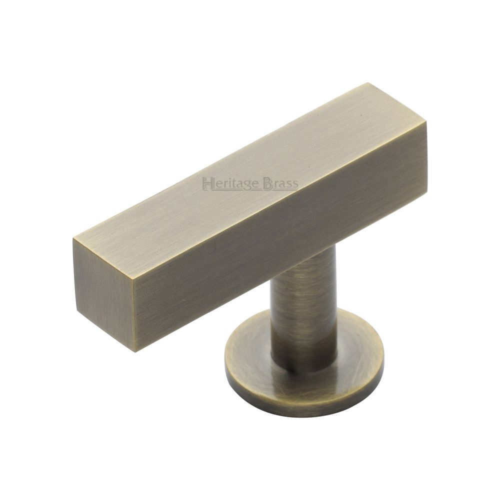 This is an image of a Heritage Brass - Cabinet Knob Offset Square Design 44mm Antique Brass Finish, c4760-44-at that is available to order from Trade Door Handles in Kendal.