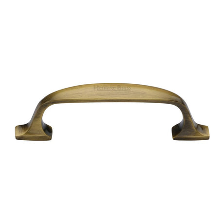 This is an image of a Heritage Brass - Cabinet Pull Durham Design 76mm CTC Antique Brass Finish, c7213-76-at that is available to order from Trade Door Handles in Kendal.