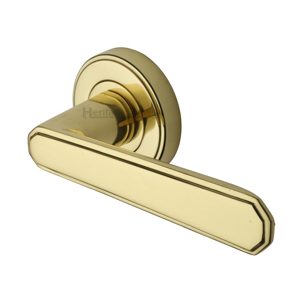 This is an image of a Heritage Brass - Door Handle Lever Latch on Round Rose Century Design Polished Brass, cen1924-pb that is available to order from Trade Door Handles in Kendal.