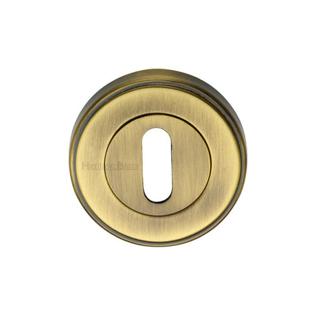 This is an image of a Heritage Brass - Key Escutcheon Antique Brass Finish, erd7000-at that is available to order from Trade Door Handles in Kendal.