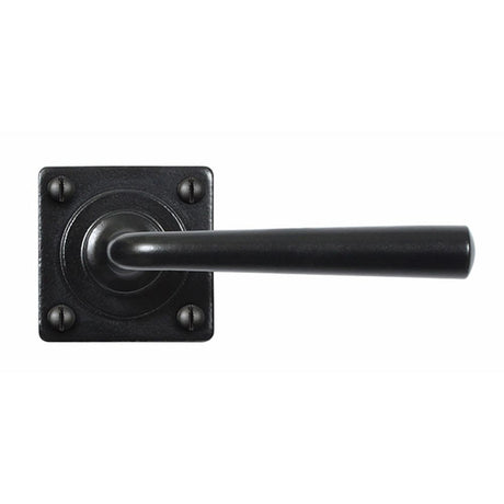 This is an image showing Stonebridge - Padstow Flat Black Lever Handle on Square Rose available from trade door handles, quick delivery and discounted prices.