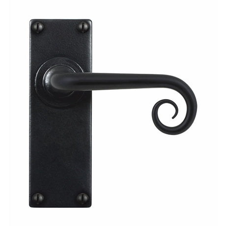 This is an image showing Stonebridge - Curl Flat Black Lever Handle on Backplate (Latch/Passage) available from trade door handles, quick delivery and discounted prices.
