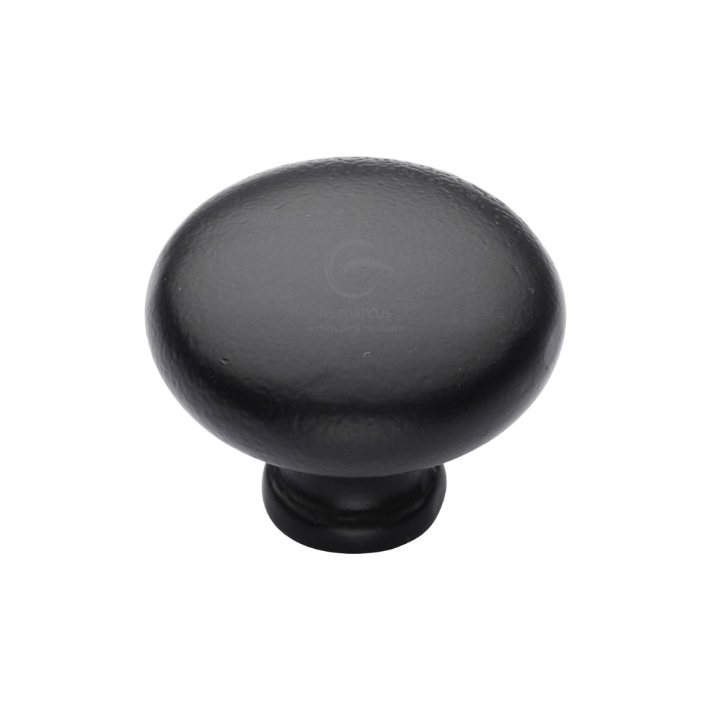 This is an image of a M.Marcus - Black Iron Rustic Cabinet Knob Round Design 32mm, fb117-32 that is available to order from Trade Door Handles in Kendal.