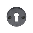 This is an image of a M.Marcus - Black Iron Rustic Key Escutcheon, fb553 that is available to order from Trade Door Handles in Kendal.