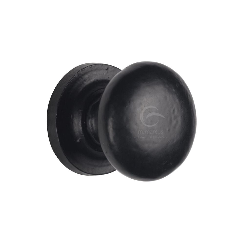 This is an image of a M.Marcus - Black Iron Rustic Cabinet Knob on Round Plate Round Design 32mm, fb613-32 that is available to order from Trade Door Handles in Kendal.