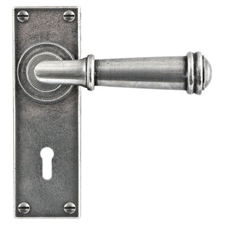 This is an image showing Finesse - Durham Pewter Door Handle on Backplate - Lock available from trade door handles, quick delivery and discounted prices