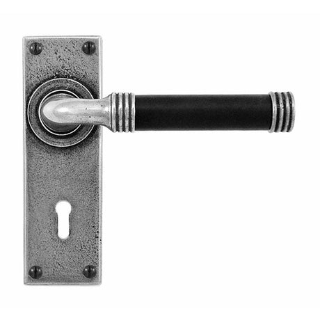 This is an image showing Finesse - Jarrow Pewter and Black Leather Door Handle on Backplate - Lock available from trade door handles, quick delivery and discounted prices