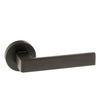 High quality image of Forme Asti Designer Lever on Minimal Round Rose - Matt Black | Sku. fmr254mb | available to order from Trade Door Handles in Kendal.