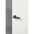 High quality image of Forme Asti Designer Lever on Minimal Round Rose - Urban Bronze | Sku. fmr254ub | available to order from Trade Door Handles in Kendal.
